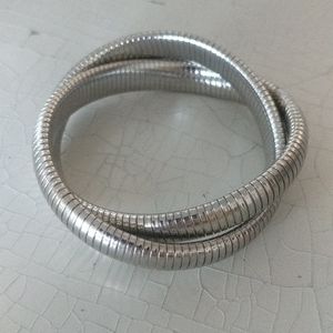 Cookie Lee 2 silver metal bracelet twined together